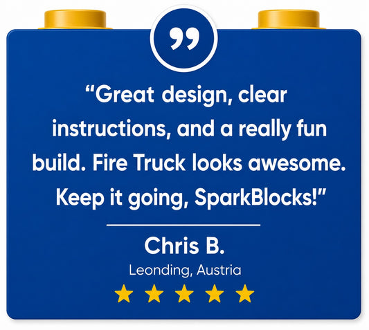 A 5 star review for SparkBlocks, written on a blue block with text and gold studs on a white background.