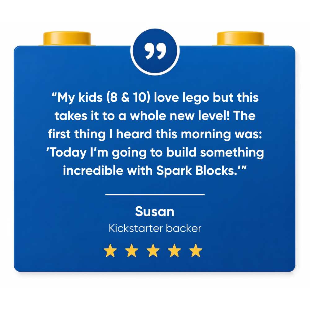 A 5 star review for SparkBlocks, written on a blue block with text and gold studs on a white background.