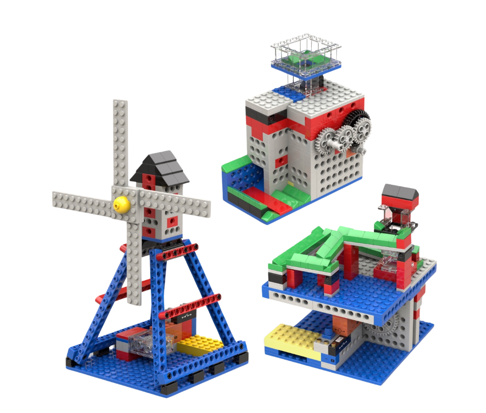 Set of colorful building blocks with a windmill and various structures on a white background