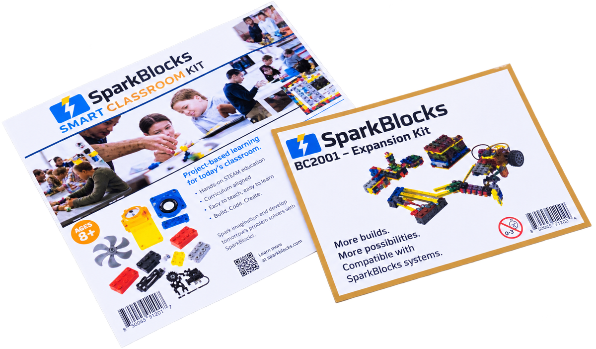 The two printed SparkBlocks guides, the Smart Classroom Kit guide and the BC2001 Expansion Kit guide