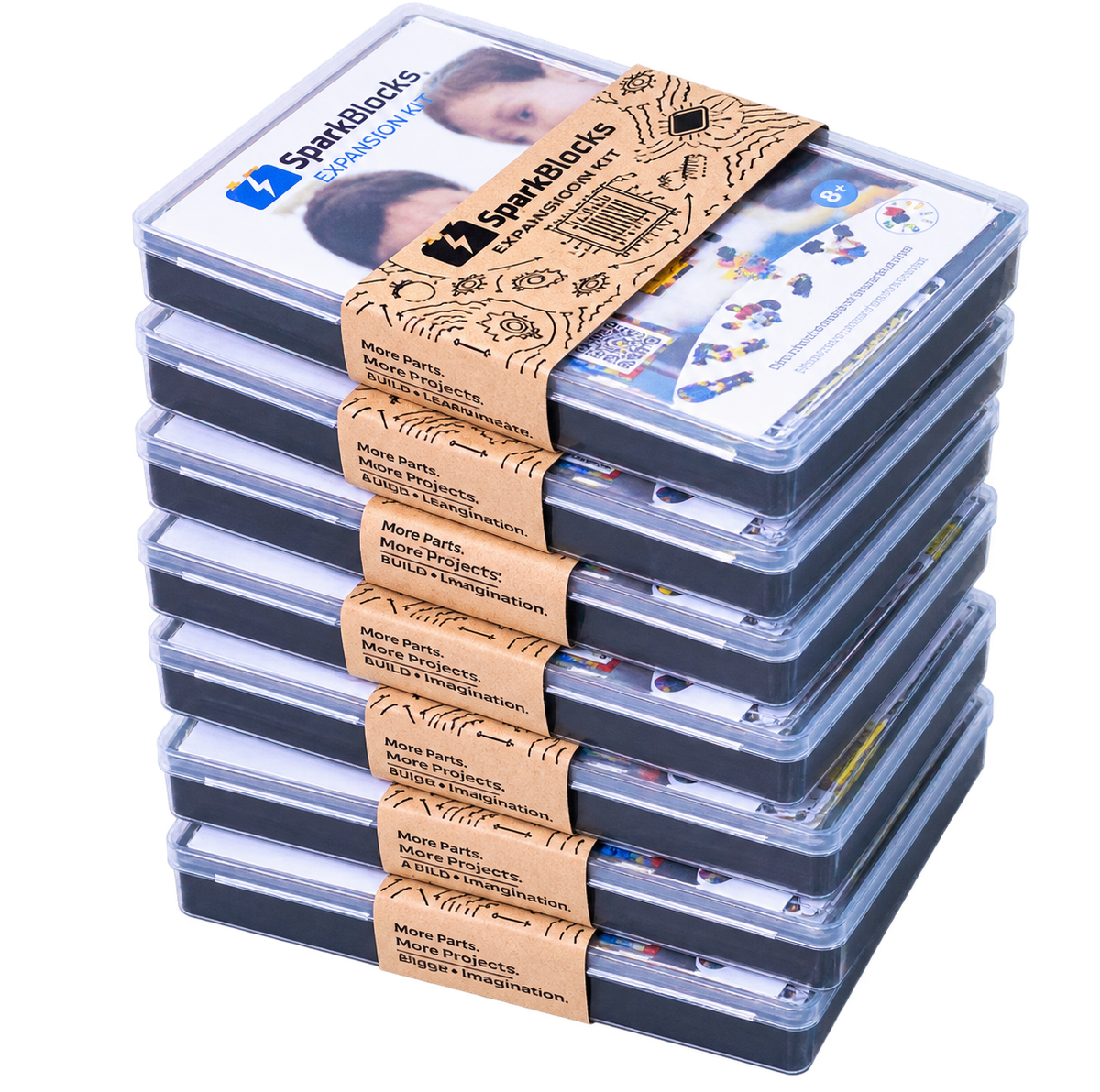 A stack of boxed SparkBlocks Intro to Circuits kits in clear cases with kraft paper bands