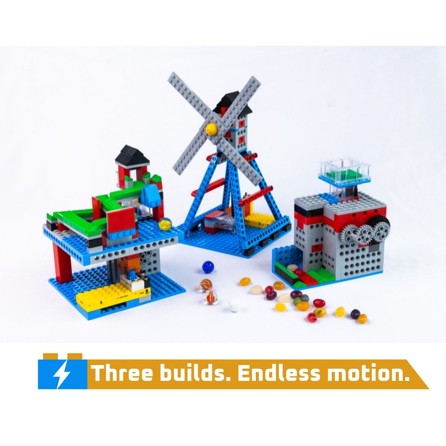 The 3-in-1 Mighty Machines Kit featuring a windmill, marble run, and gear-driven structure with the text "Three builds. Endless motion," showcasing a motorized STEM toy and screen-free STEM toy.